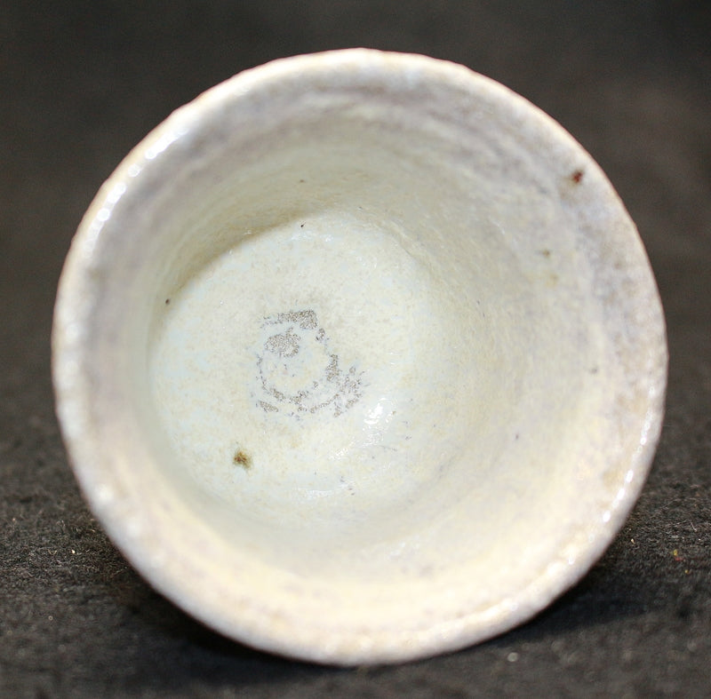 25287 Nishioka Koju (Patterned Karatsu sake cup) 